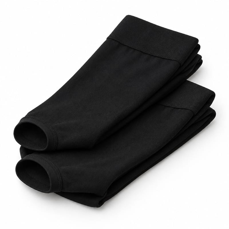 Two pairs of black knee-high support hose with open toes, folded neatly together